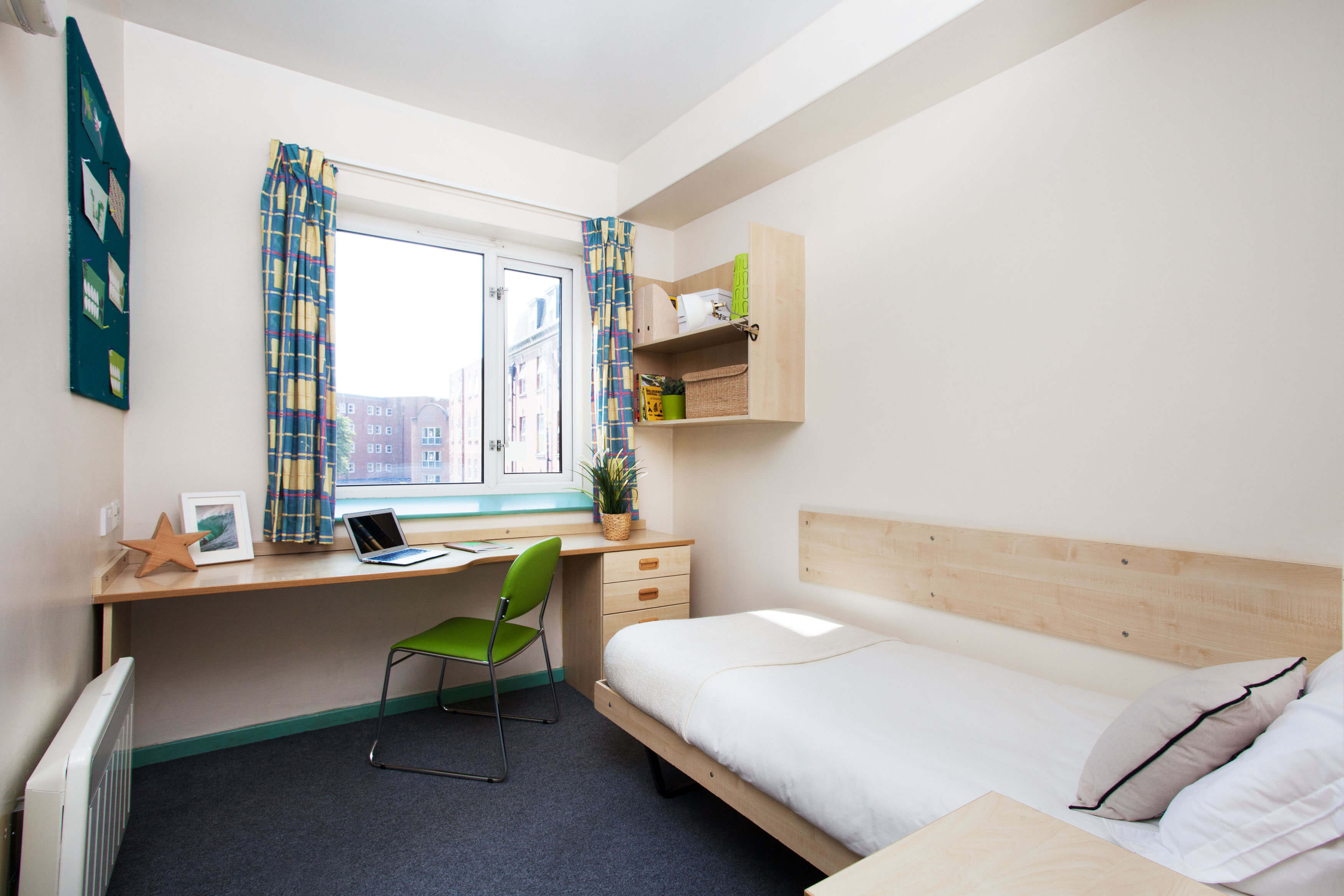 Bed and study space in a Classic En-suite room