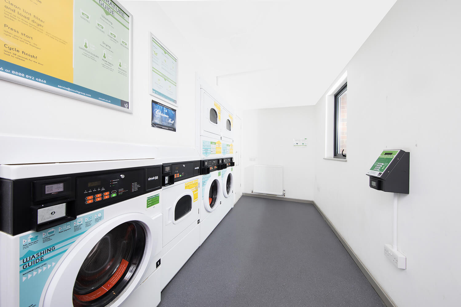 Student accommodation London laundry room with washing machines at St Pancras Way