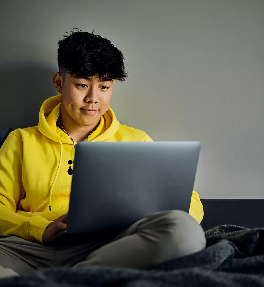 Boy using laptop