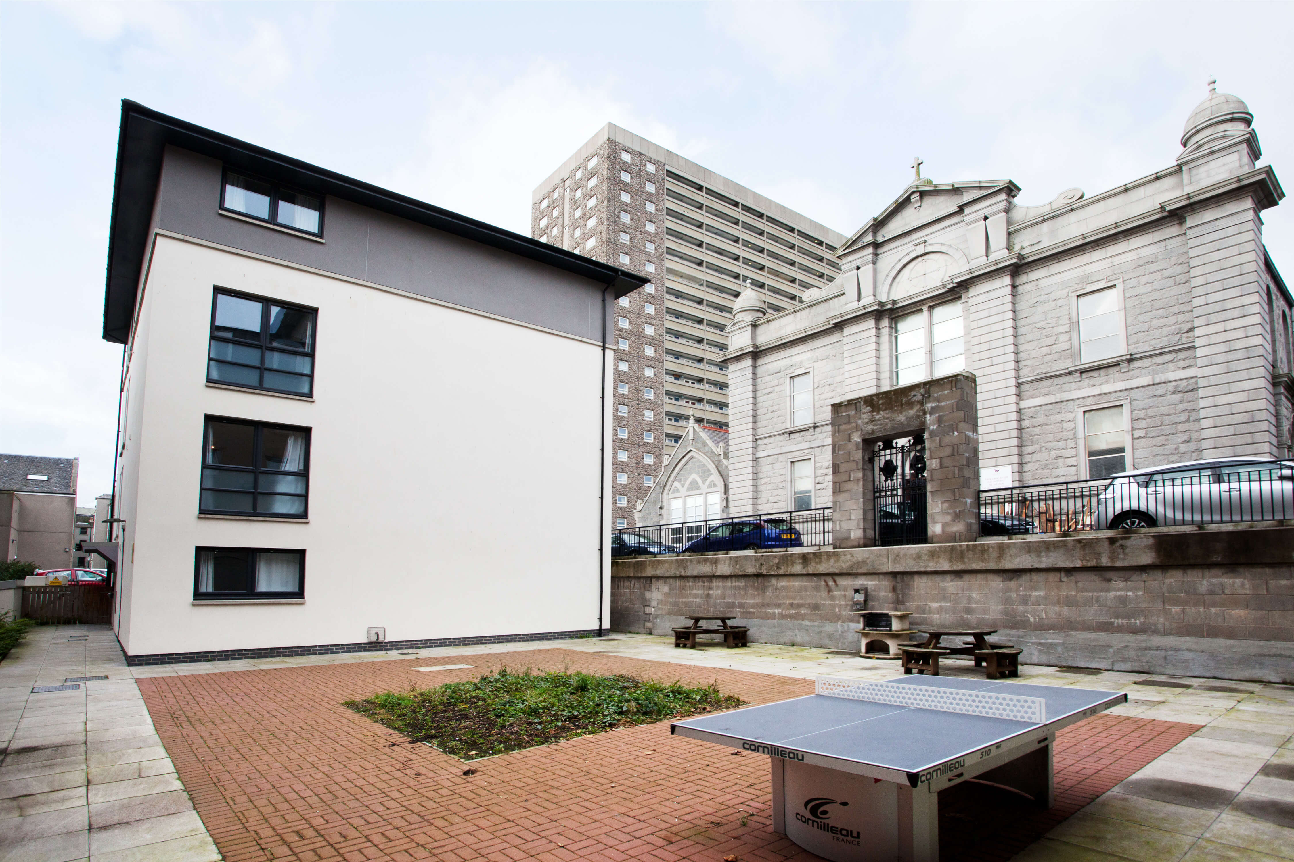 Outdoor courtyard with ping pong table