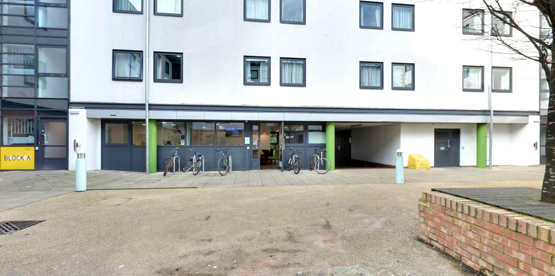 Bike stands at an entrance to a building