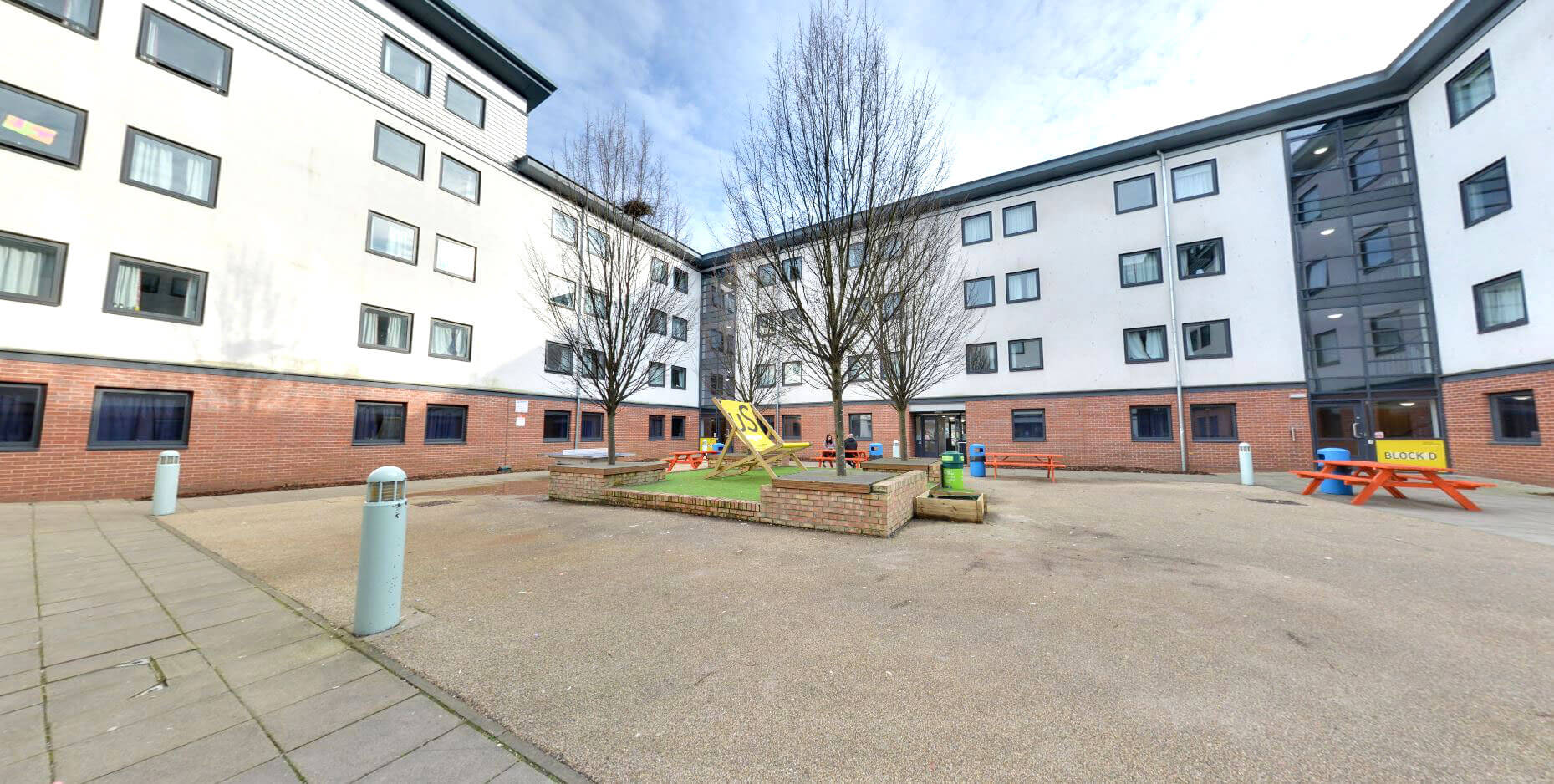 Outdoor courtyard surrounded by buildings