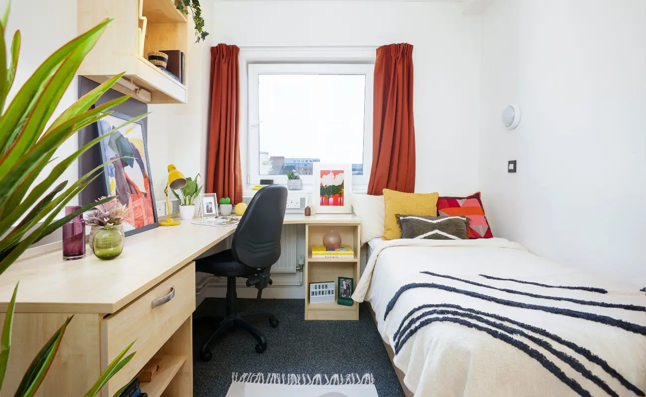 Bed and study space in an Ensuite Premium Range 1