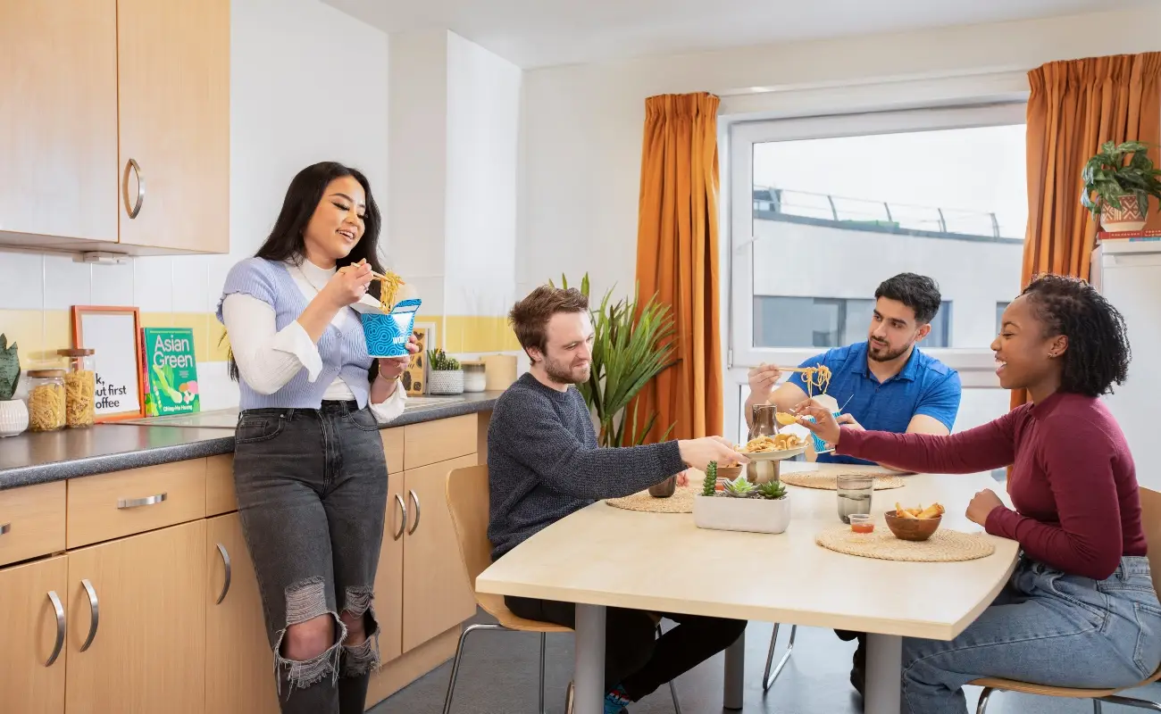 Students in a shared kitchen