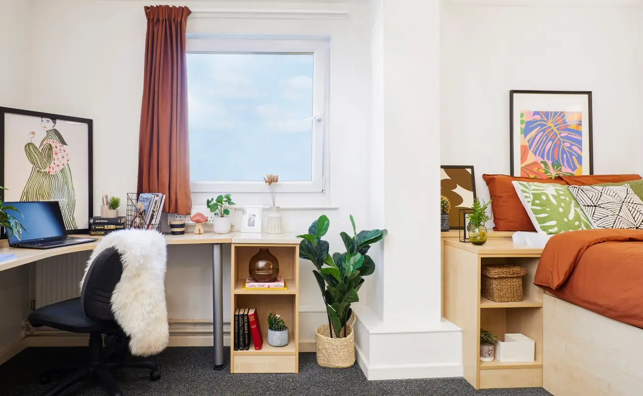 Bed and study space in an Accessible Ensuite Premium Range 1