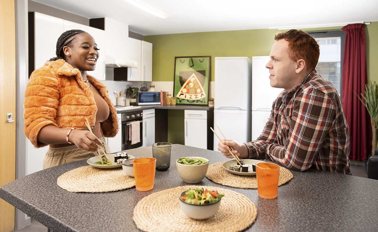 Students in the shared kitchen for ensuite rooms