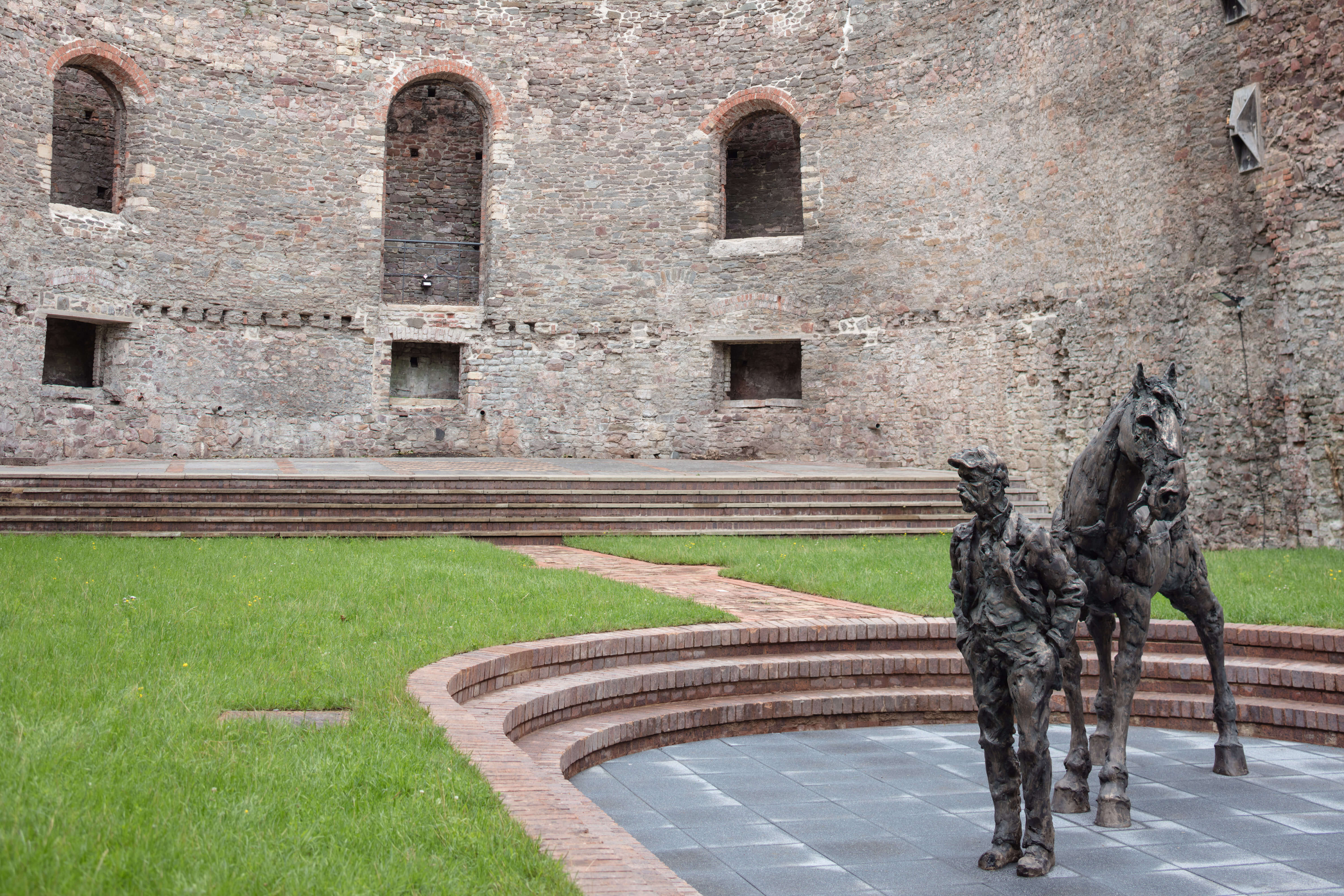 Statue of a horse and man