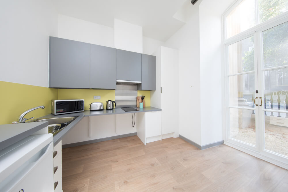 Kitchen with glass doors to outside