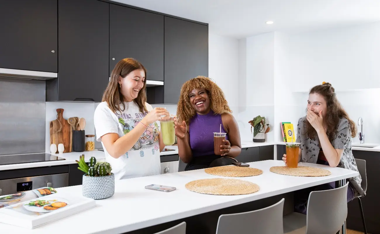 Students in a shared kitchen