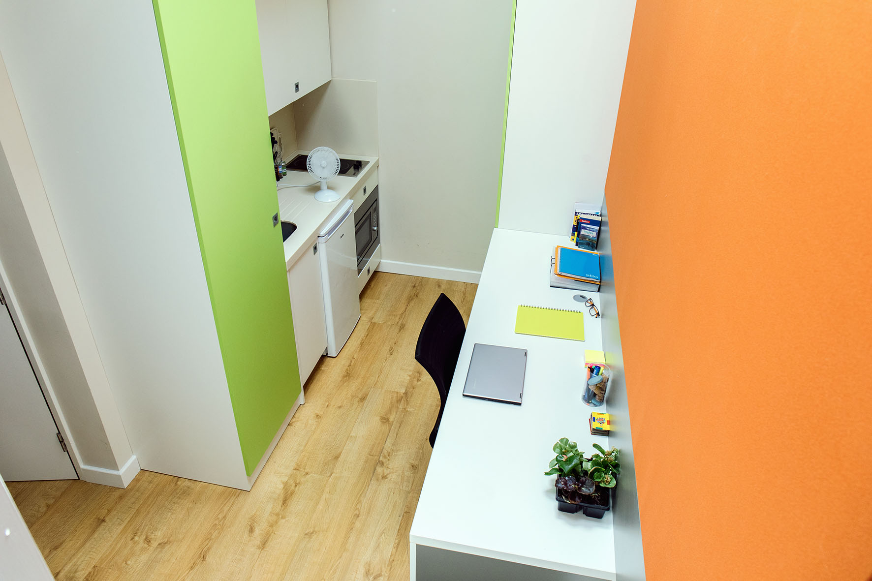 Kitchen and study space in a Premium Range 1 Bedroom flat at Cathedral Park in Bristol, Unite Students accommodation