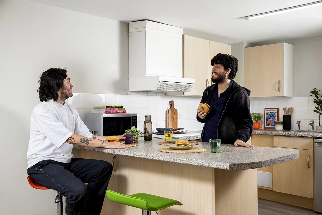 Students in the shared kitchen