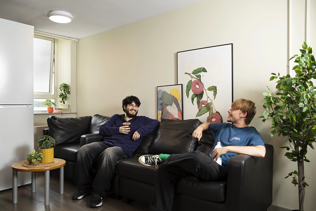Students in the shared kitchen in the sofa