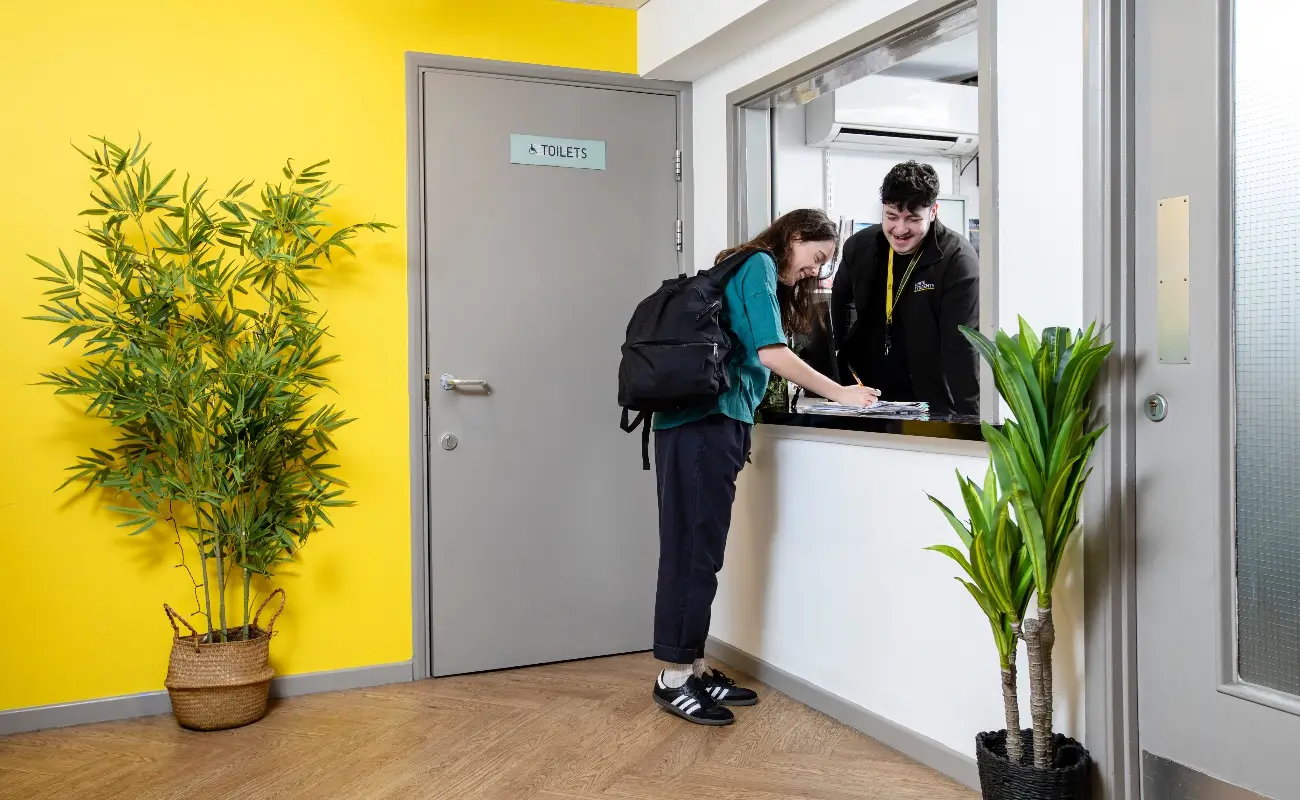 Student in the reception area