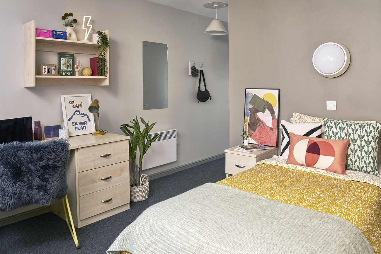 Bed and study space in a Studio