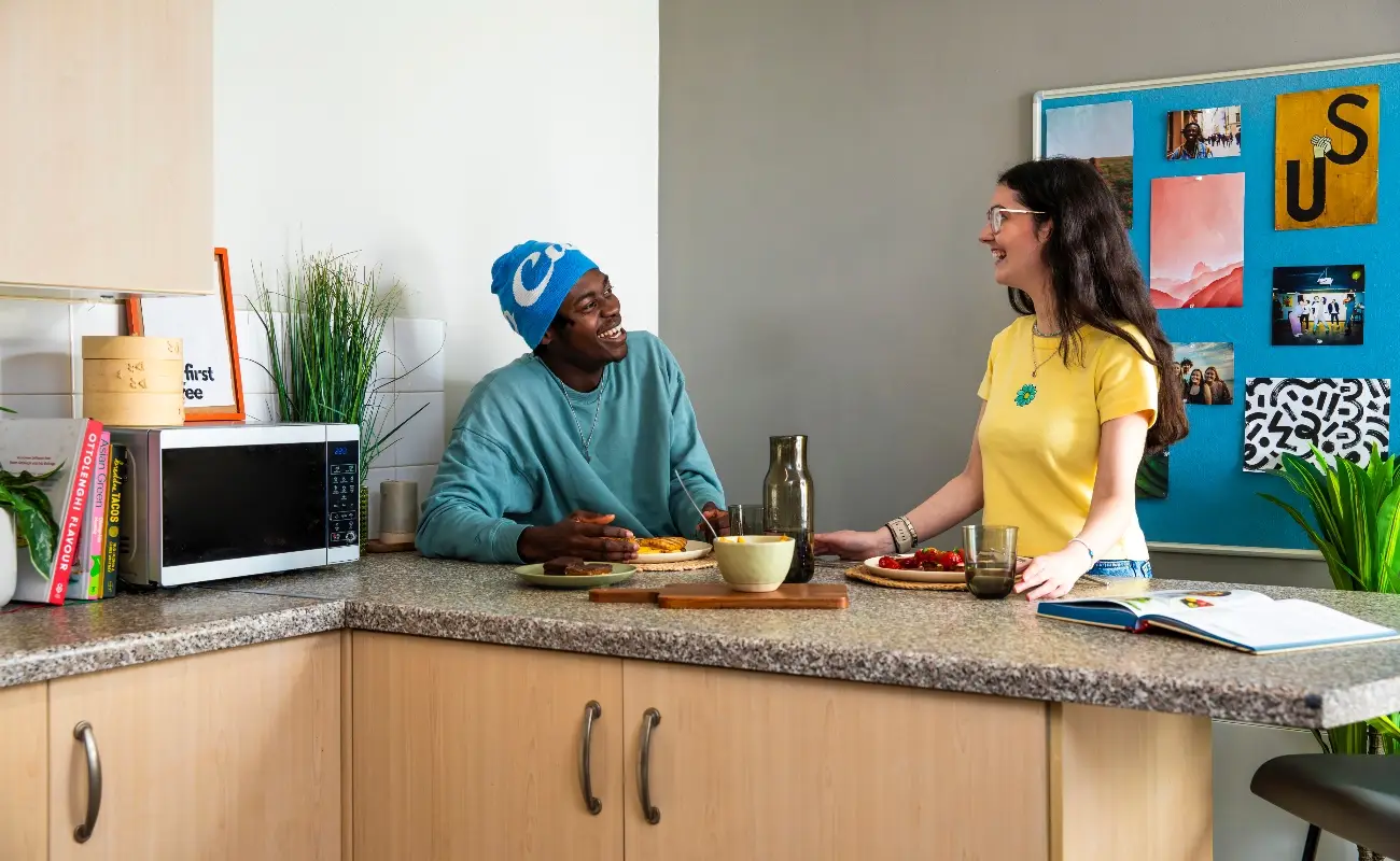 Students in a shared kitchen