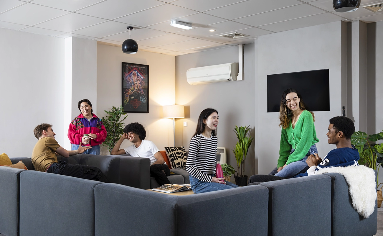 Students in the common room TV area