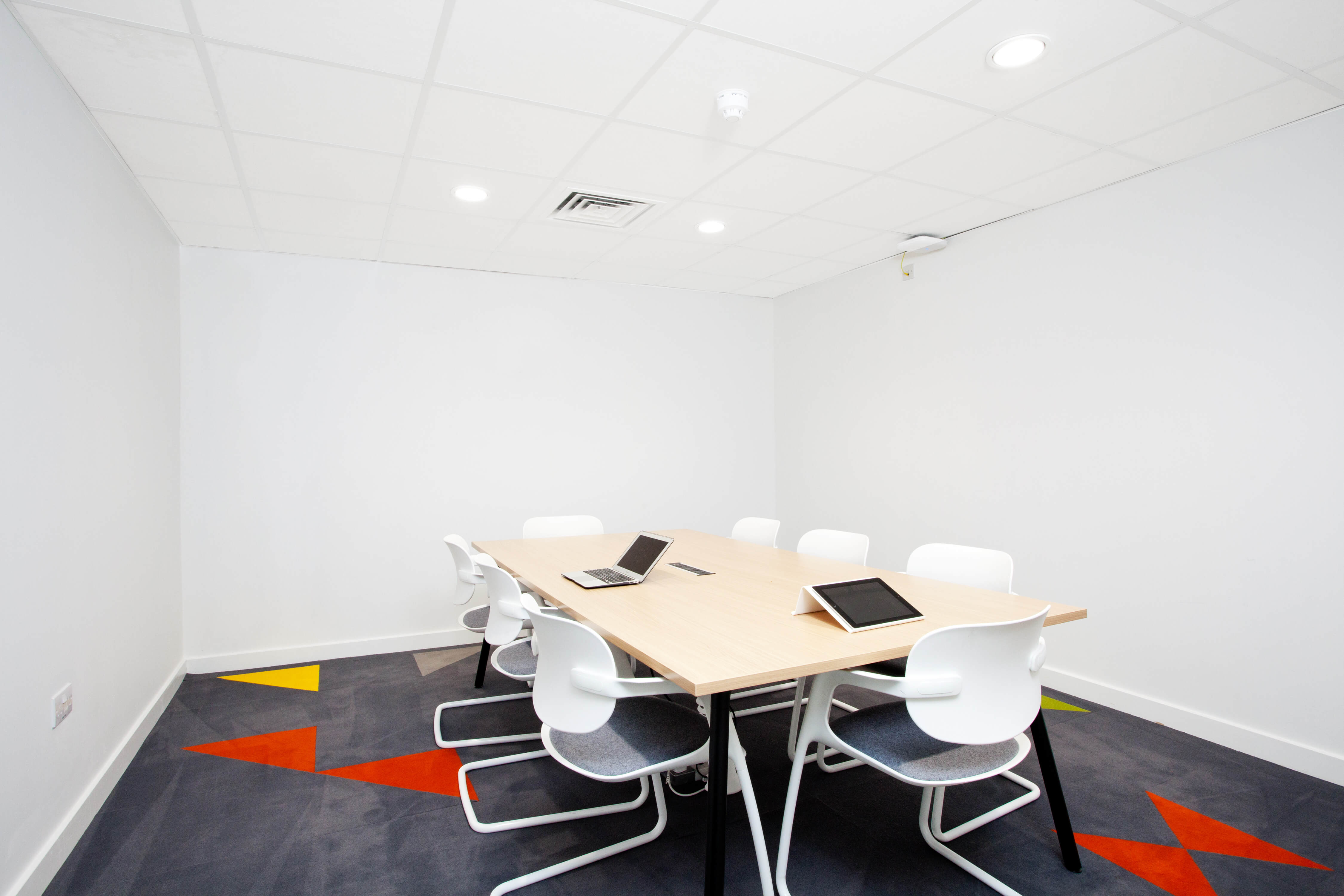 Desk and chairs in study room