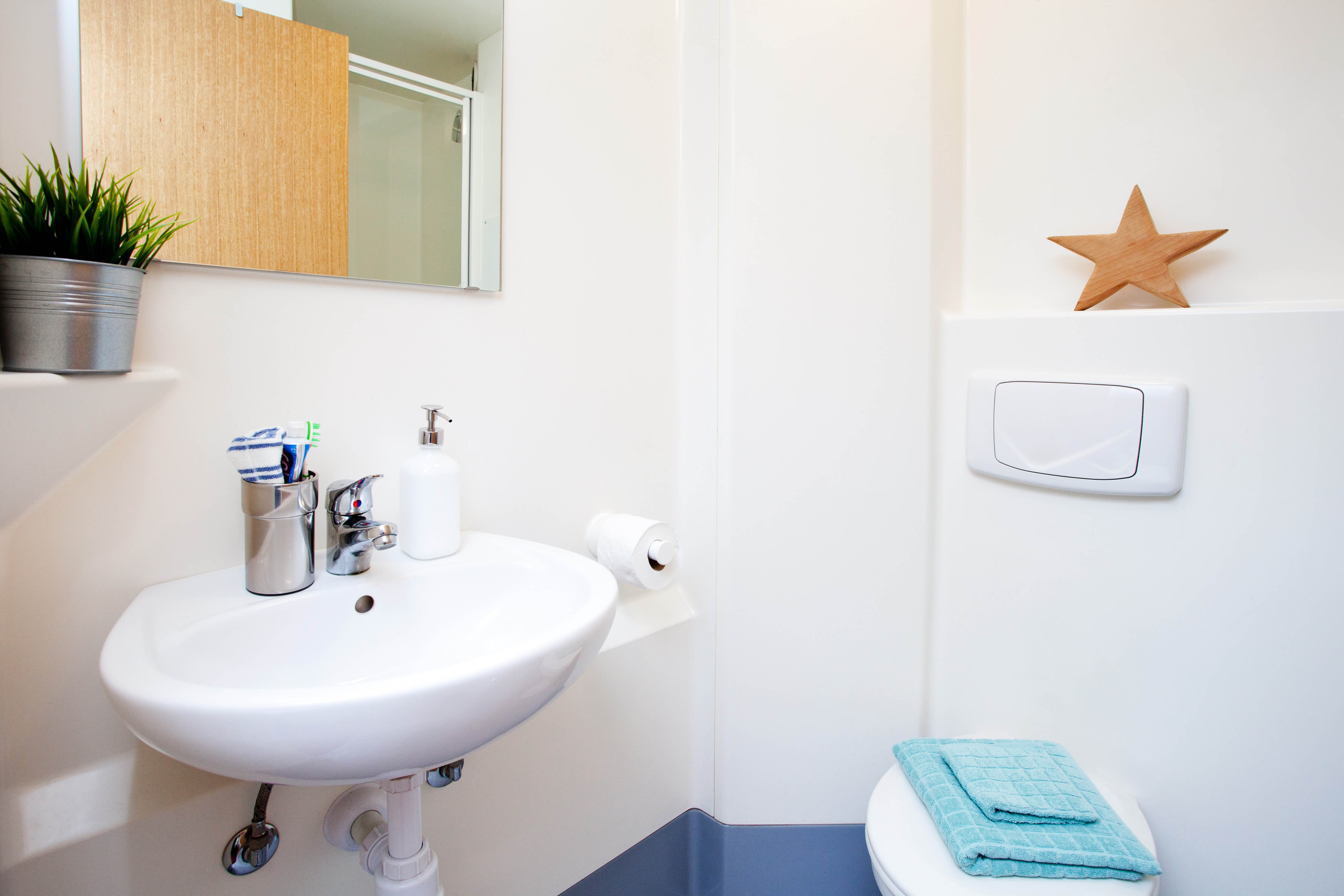 Sink and toilet in bathroom