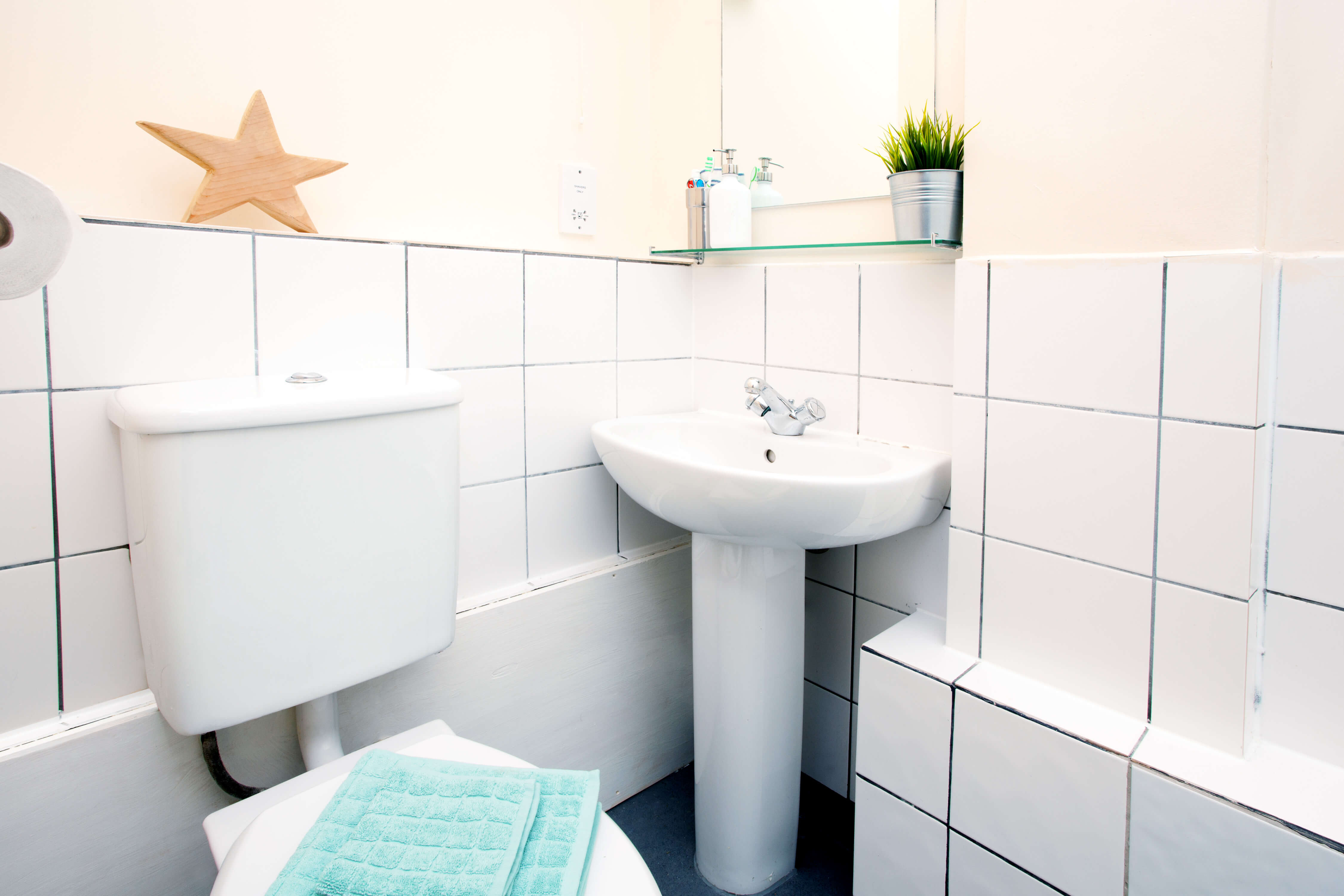 Sink and toilet in bathroom