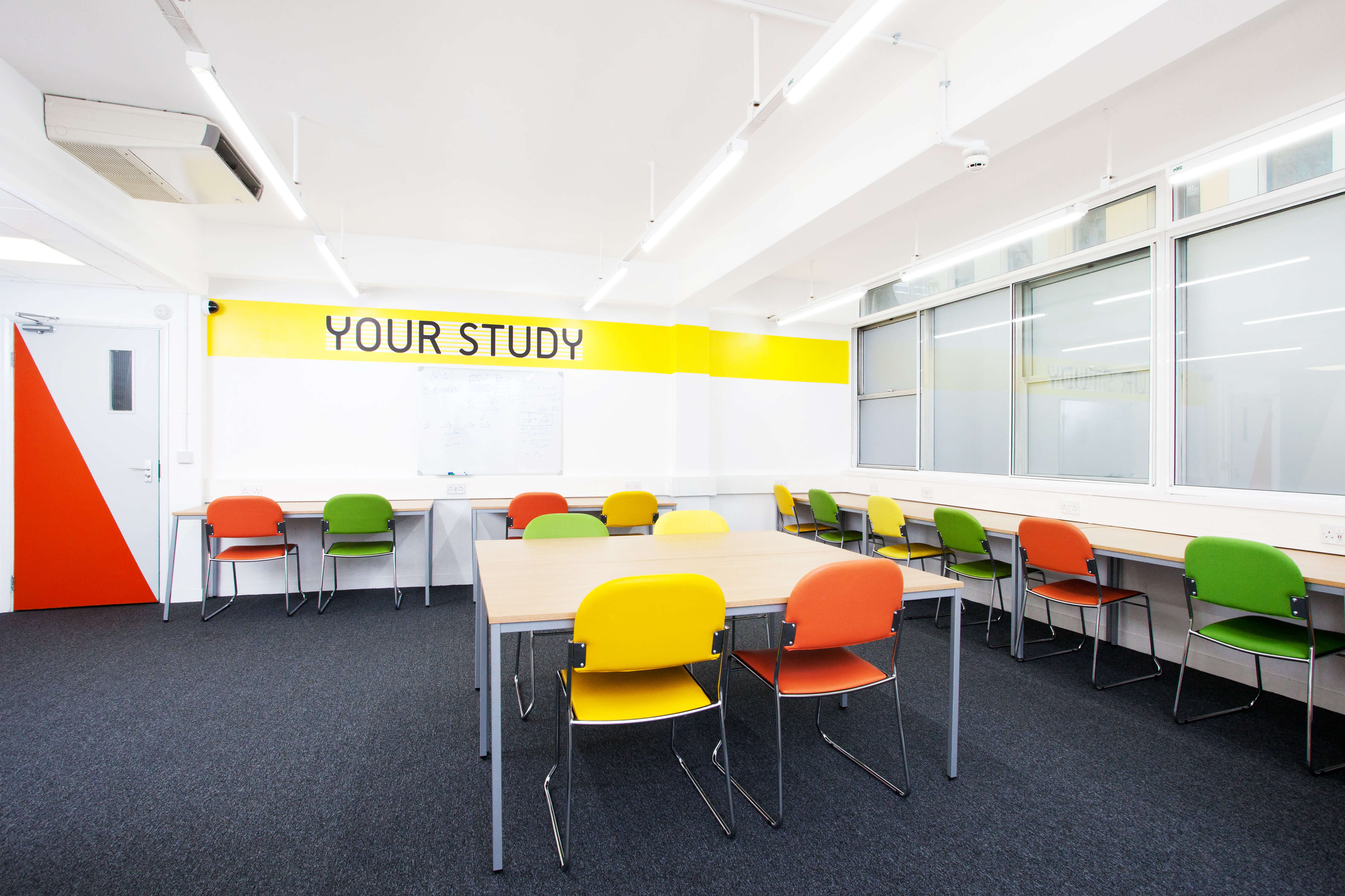 Desk and chairs in study room