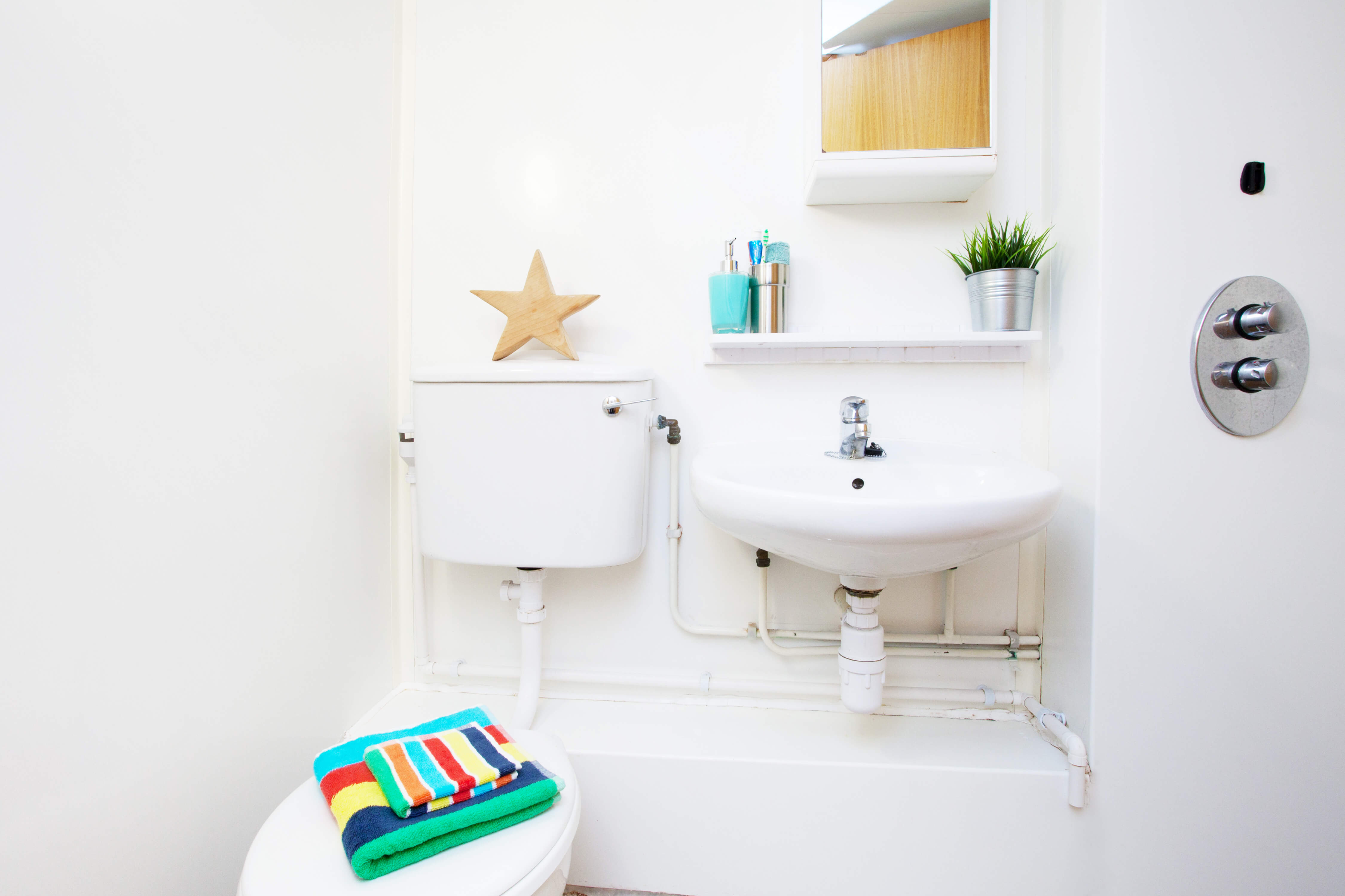 Sink and toilet in bathroom