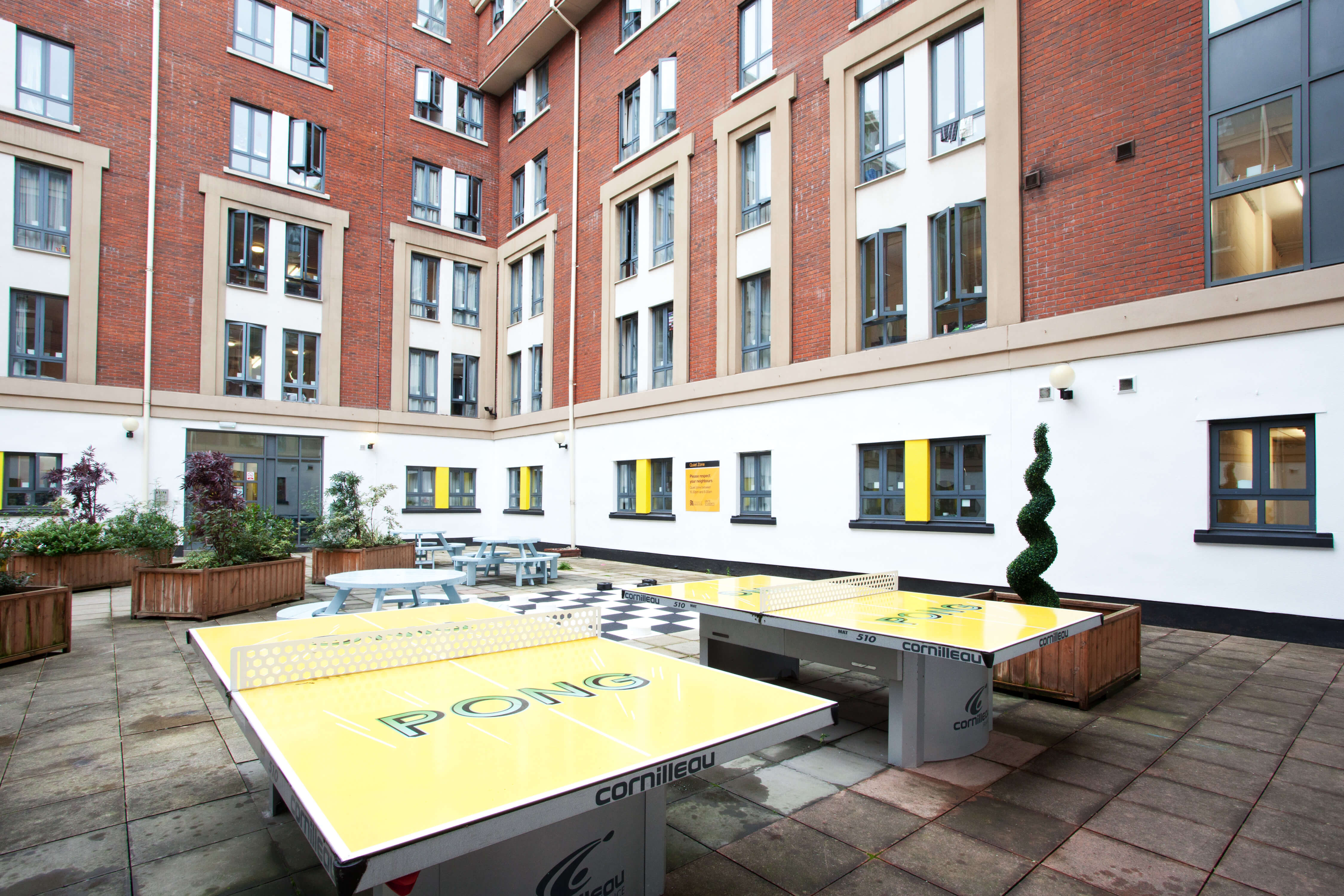 Ping pong tables in courtyard 