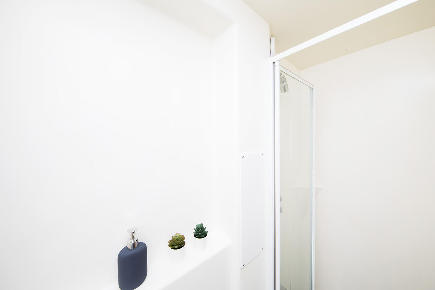 Shower cubicle in an en-suite room at Raglan House student accommodation in Coventry