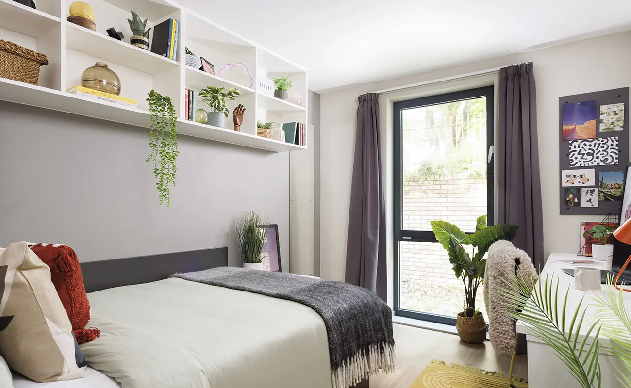 Bed and study space in an Ensuite Classic