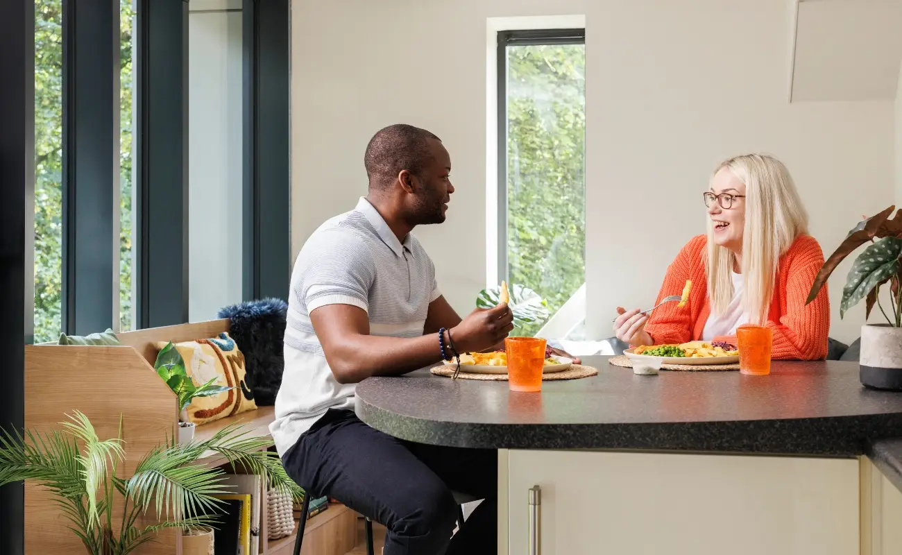 Students in a shared kitchen