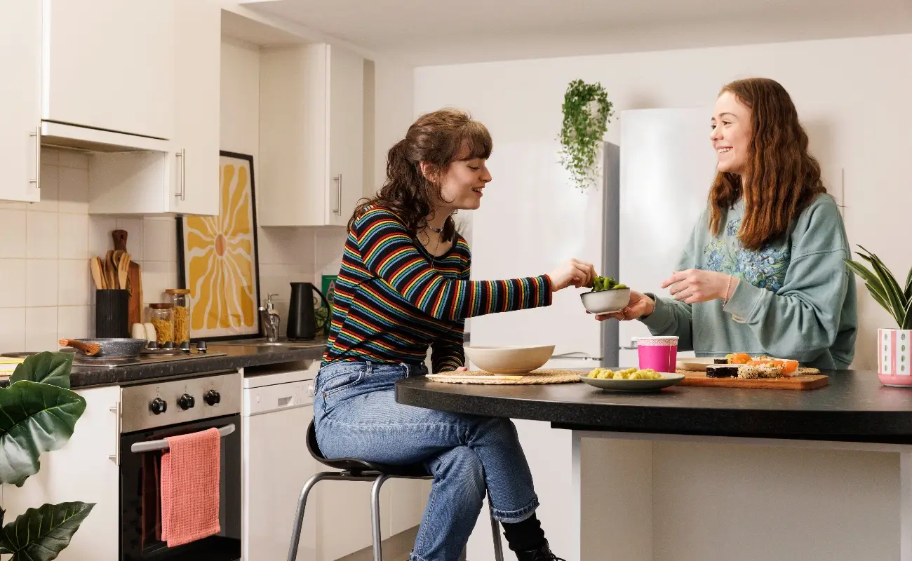 Students in a shared kitchen