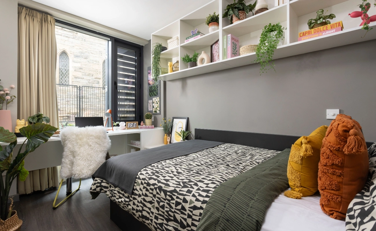 Bed and study space in an Ensuite Classic