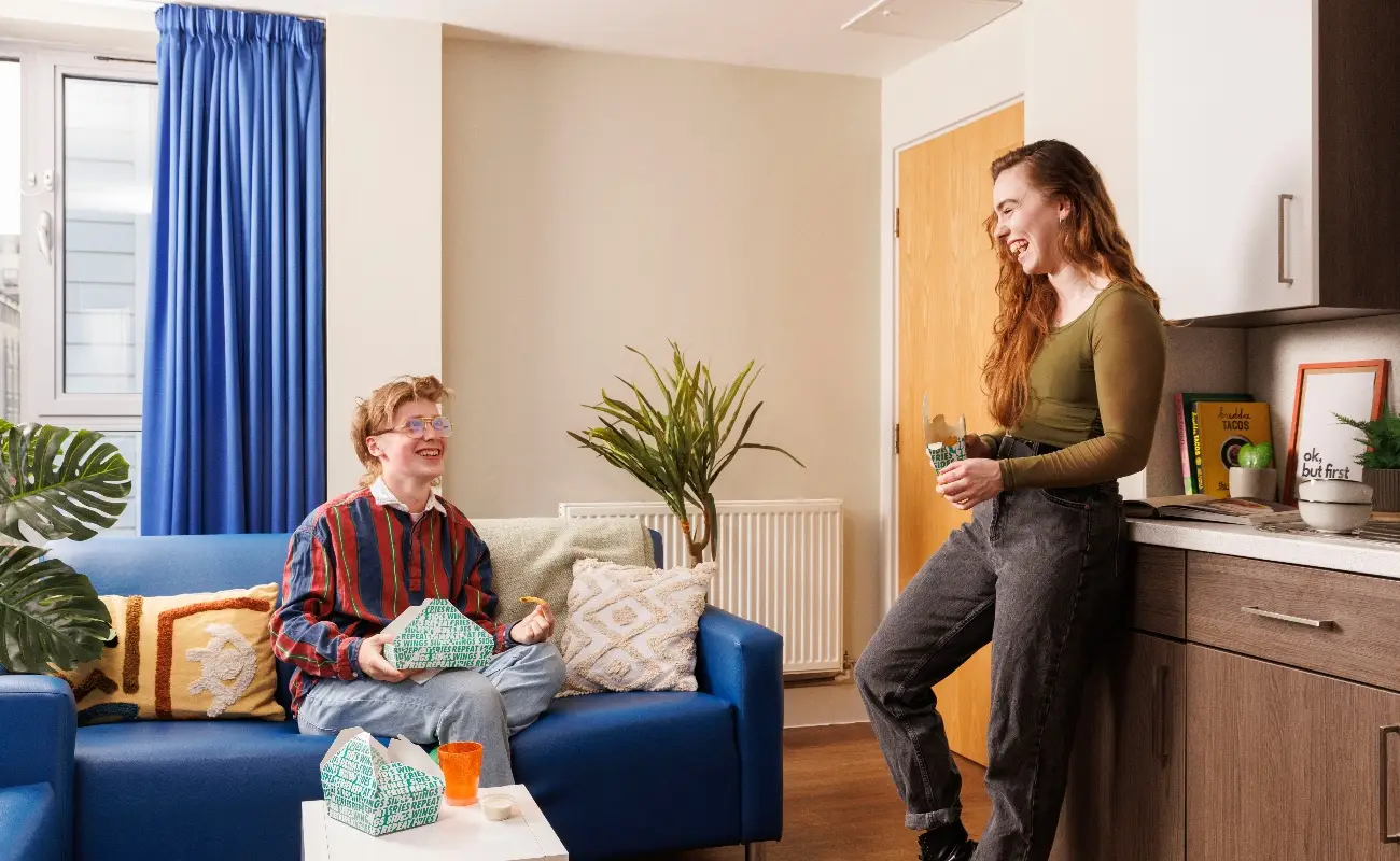 Students in a shared kitchen