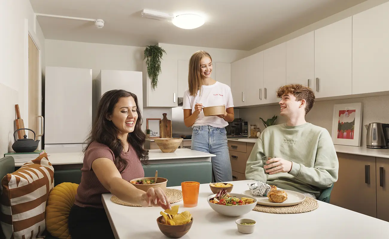 Students in a shared kitchen