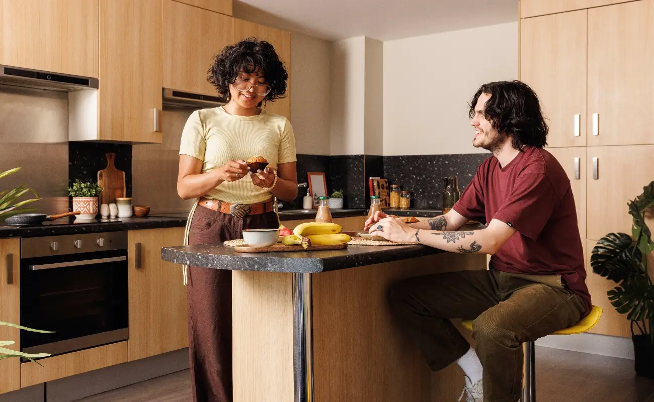 Students in a shared kitchen