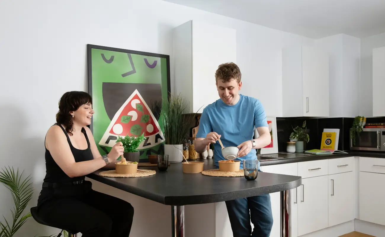 Students in a shared kitchen