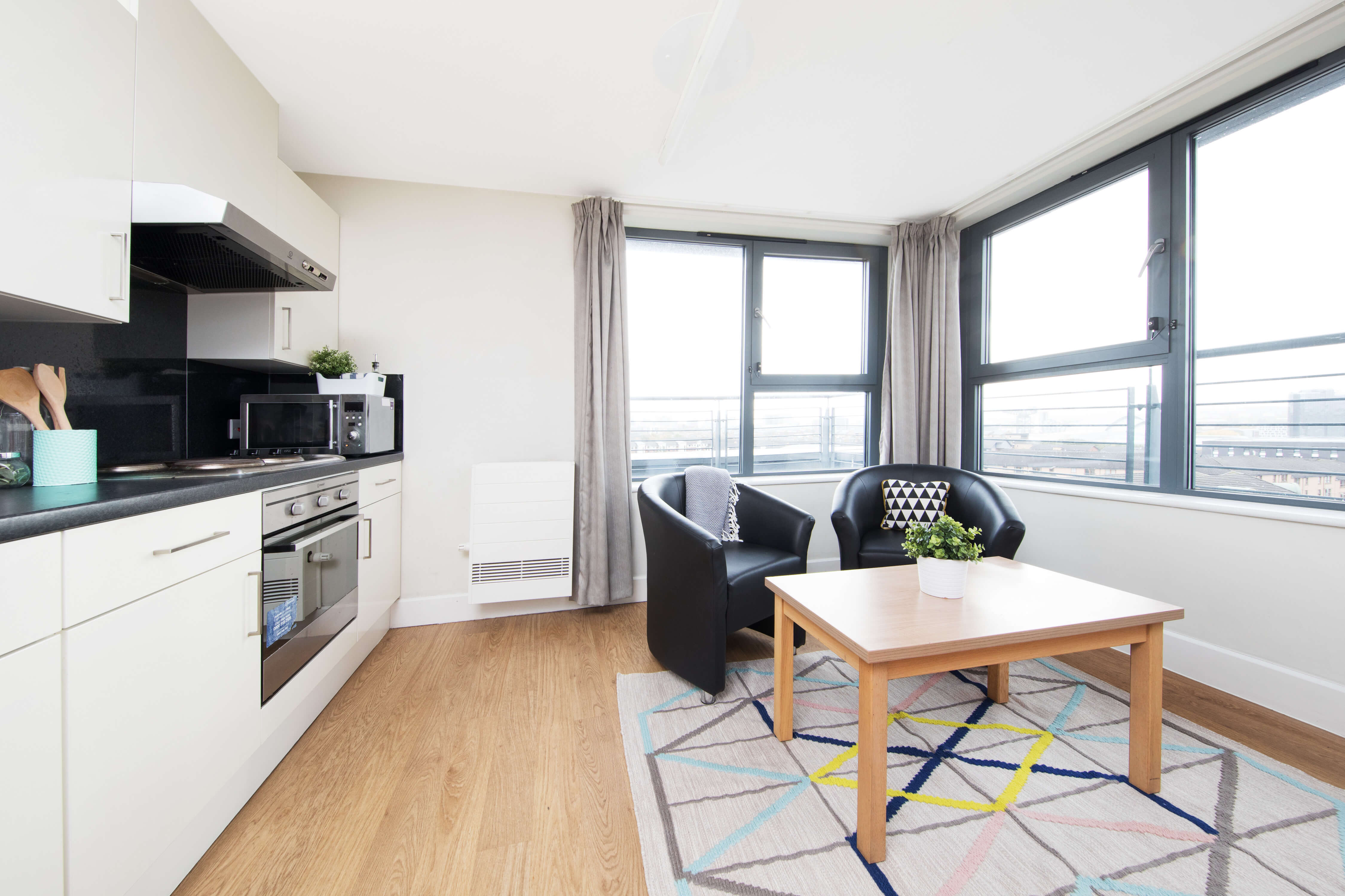 Kitchen and sofa seating area