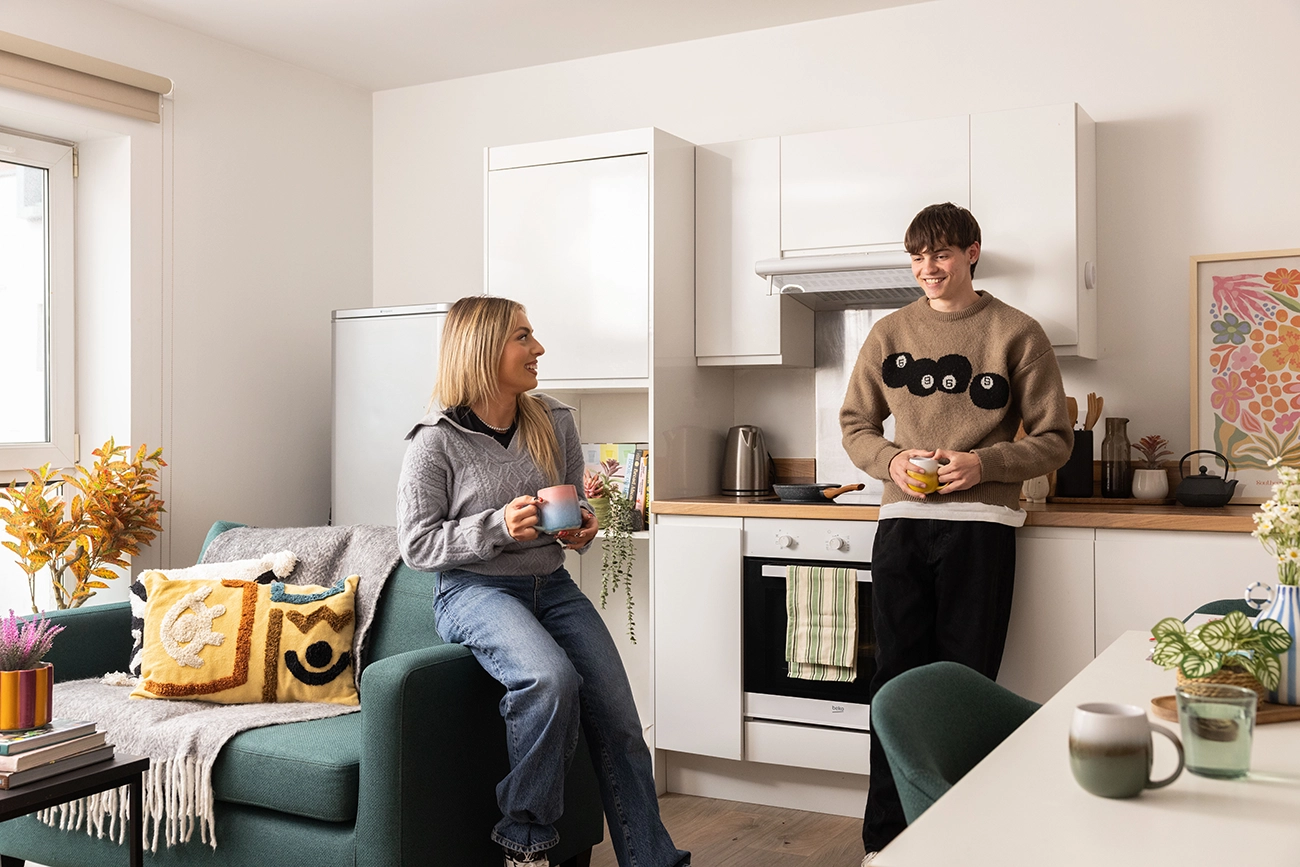 Students in a shared kitchen
