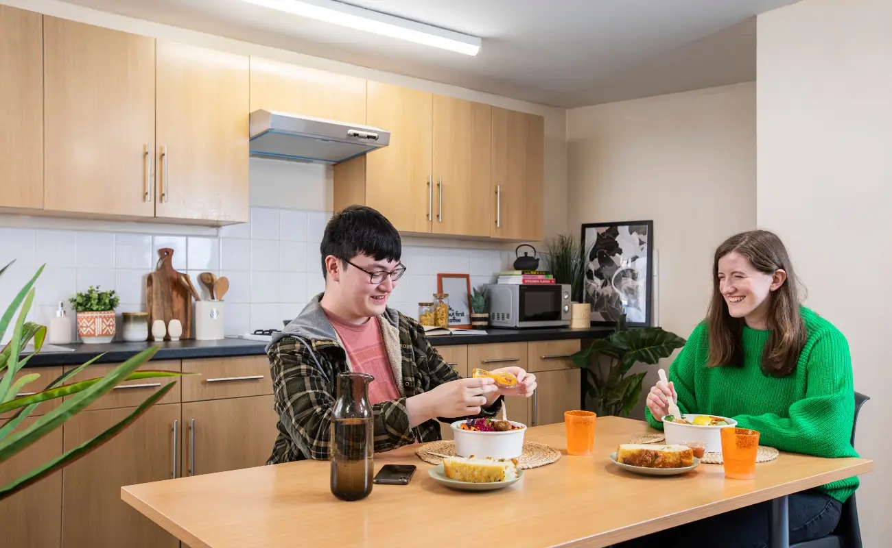 Students in a shared kitchen