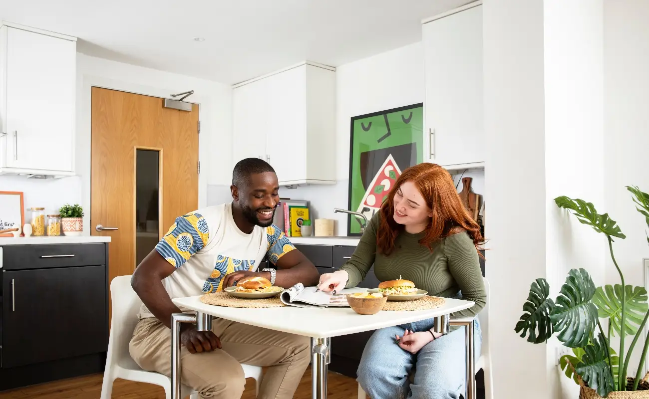 Students in a shared kitchen