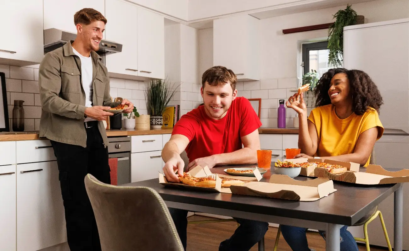 Students in a shared kitchen