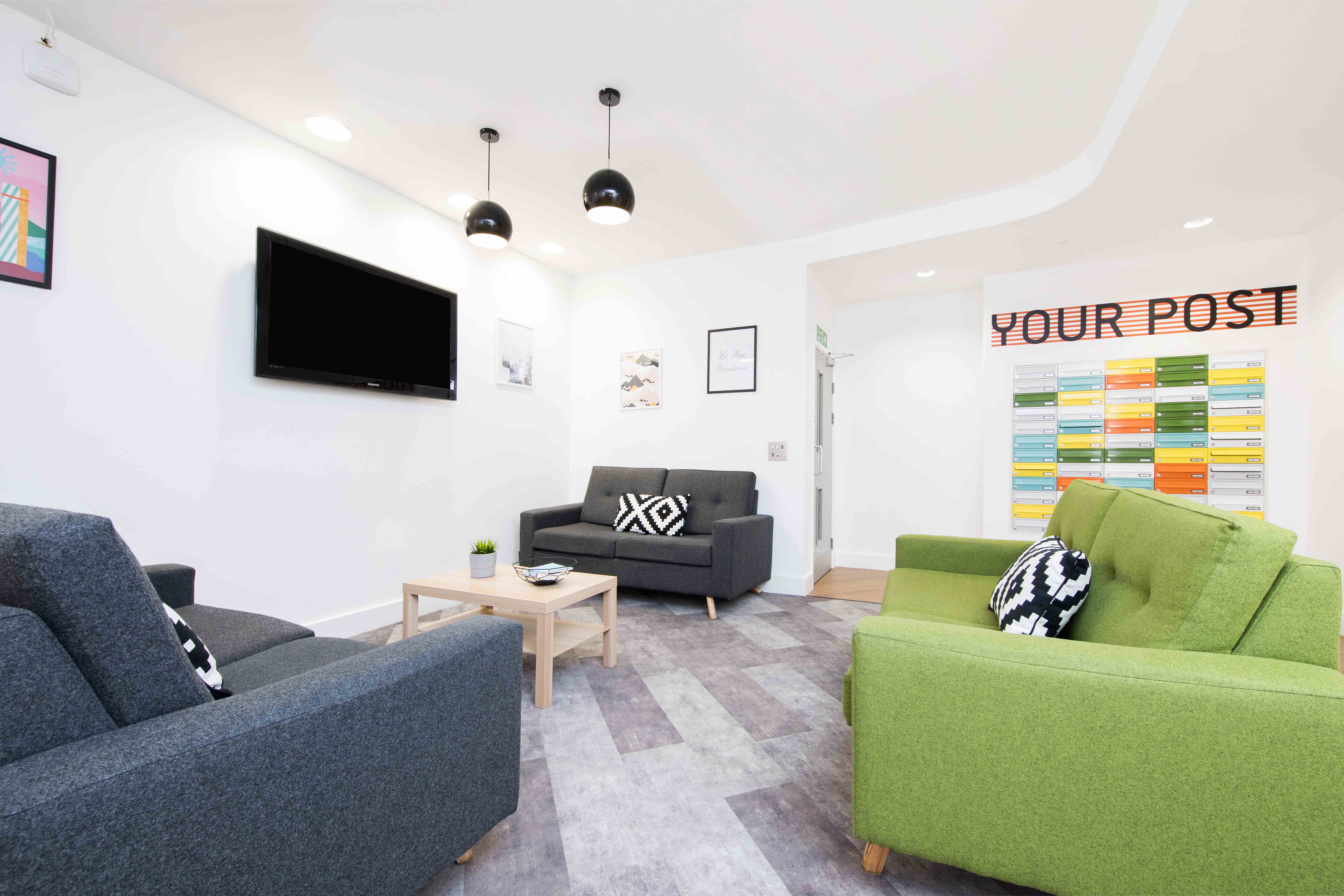 Sofas and TV in the common room