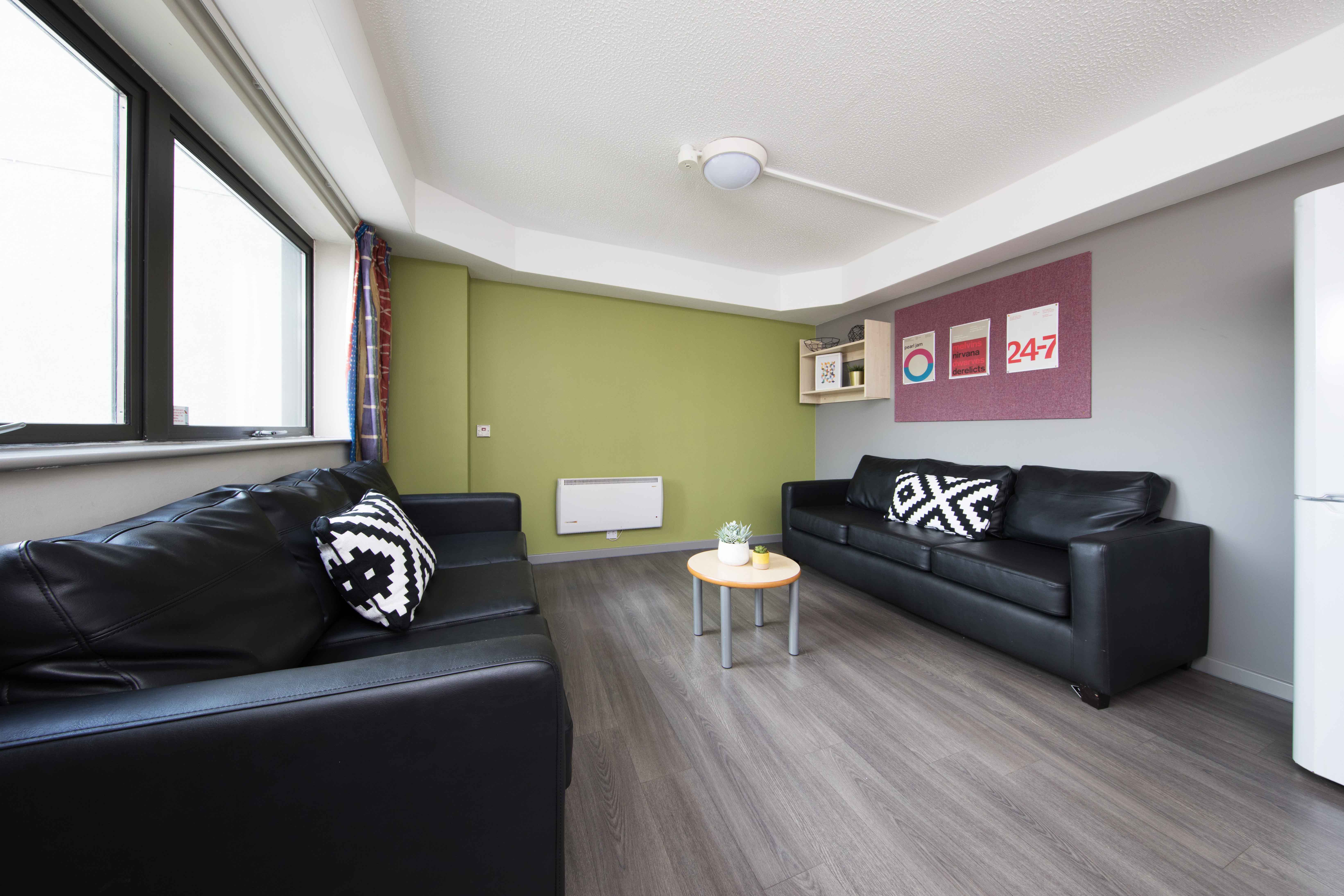 Sofas in a shared kitchen for ensuite rooms