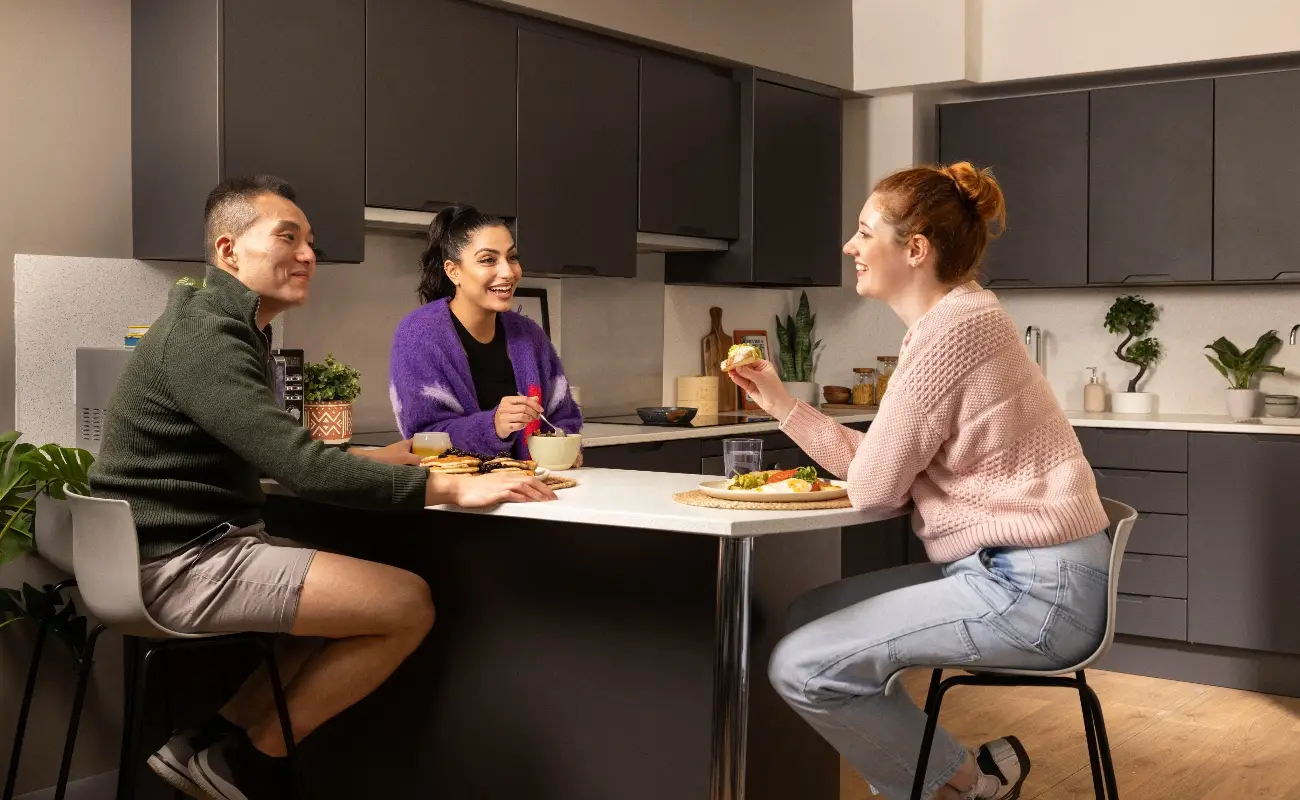 Students in a shared kitchen
