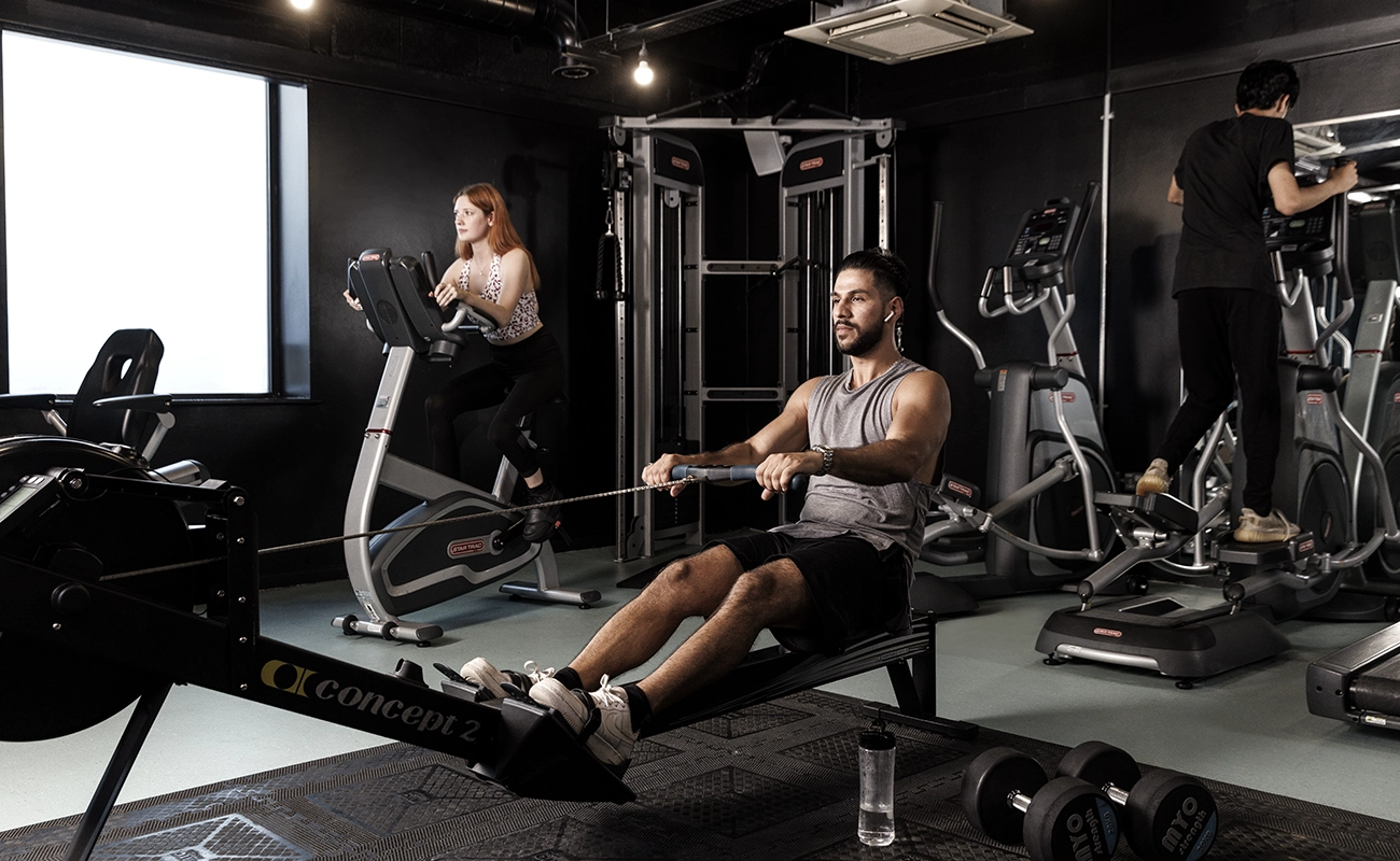 Students in the shared gym at Sky Plaza