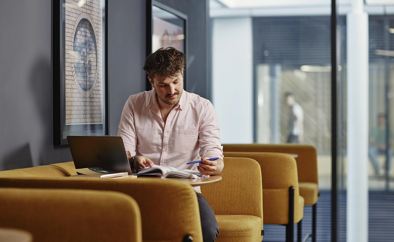 Student studying in the sudy space