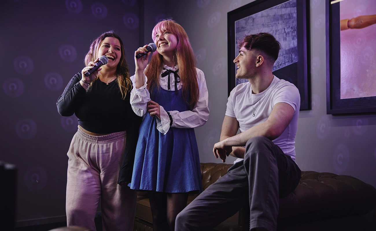 Students using the karaoke room