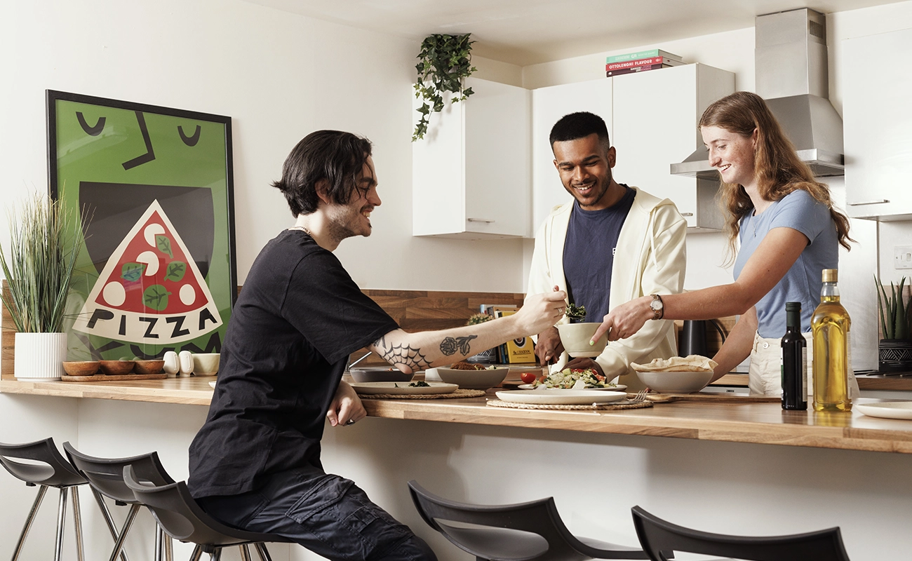 Students using the shared kitchen