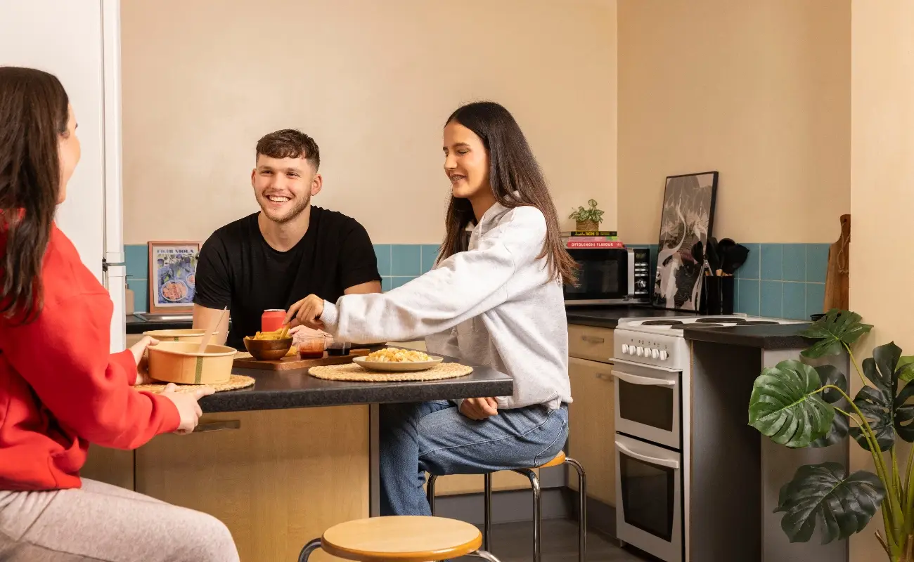 Students in a shared kitchen