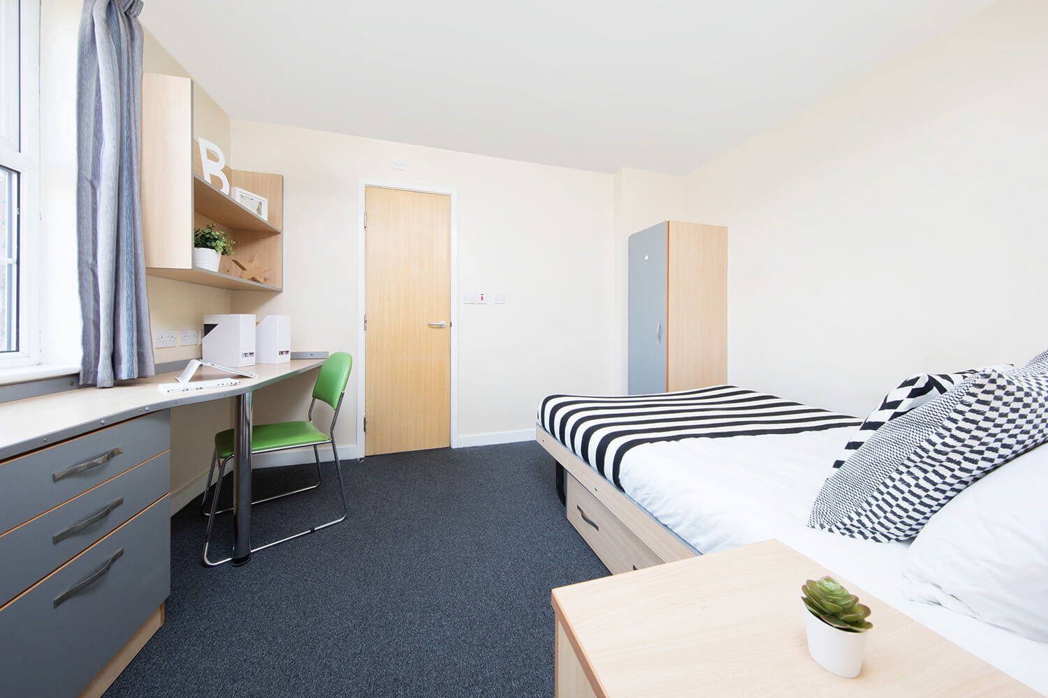 Liverpool student accommodation bedroom with bed and study space
