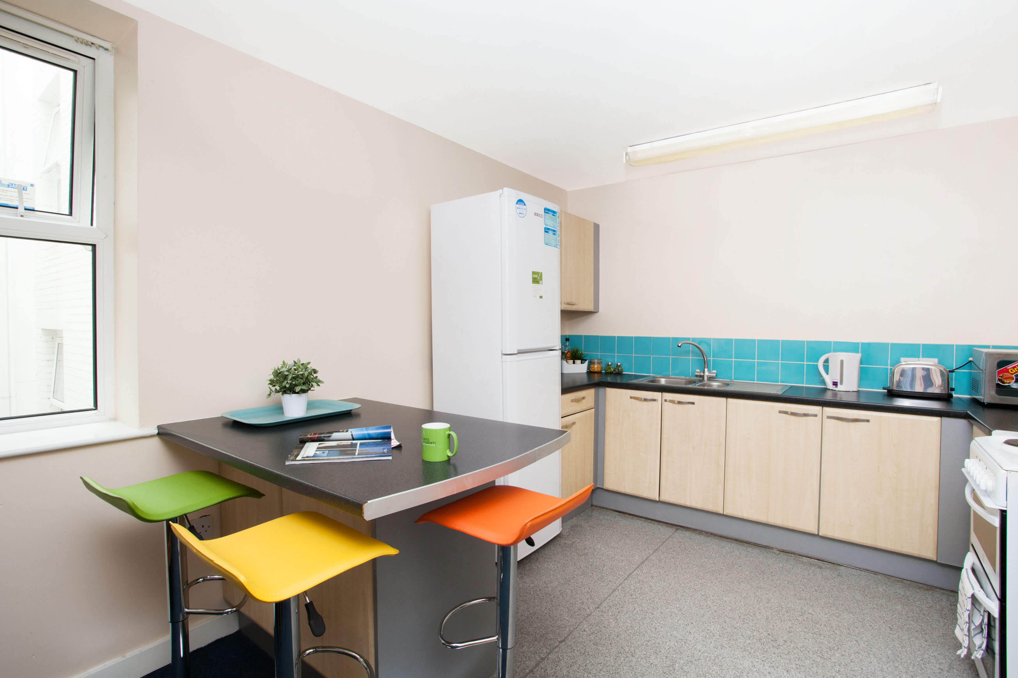 Student accommodation shared kitchen and breakfast bar for en-suite rooms in Liverpool